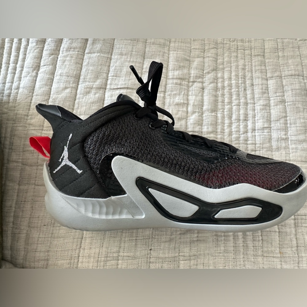 Size 7 Tatum basketball sneakers.Worn a handful of times for indoor games.